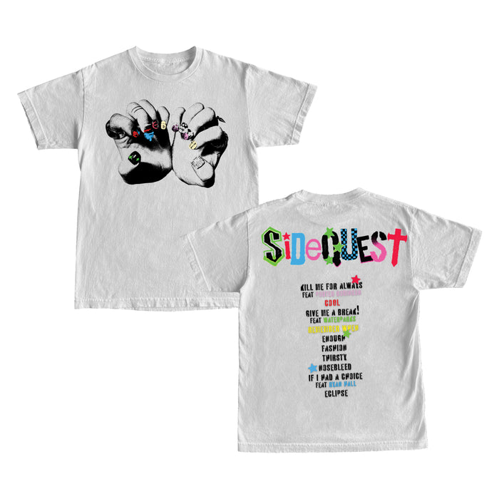White printed t-shirt by Michael Clifford featuring a hand with rings graphic on the front. The back displays โSideQuestโ in colorful letters and assorted phrases. Made from soft Comfort Colors fabric for maximum comfort.
