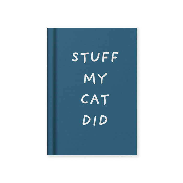 A7 hardback fabric notebook with teal cover and white 'STUFF MY CAT DID' lettering