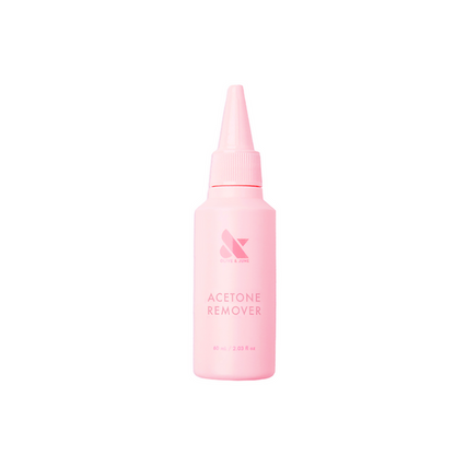 Pink squeeze bottle of Acetone Remover designed for easy at-home removal of gel polish and press-on nails