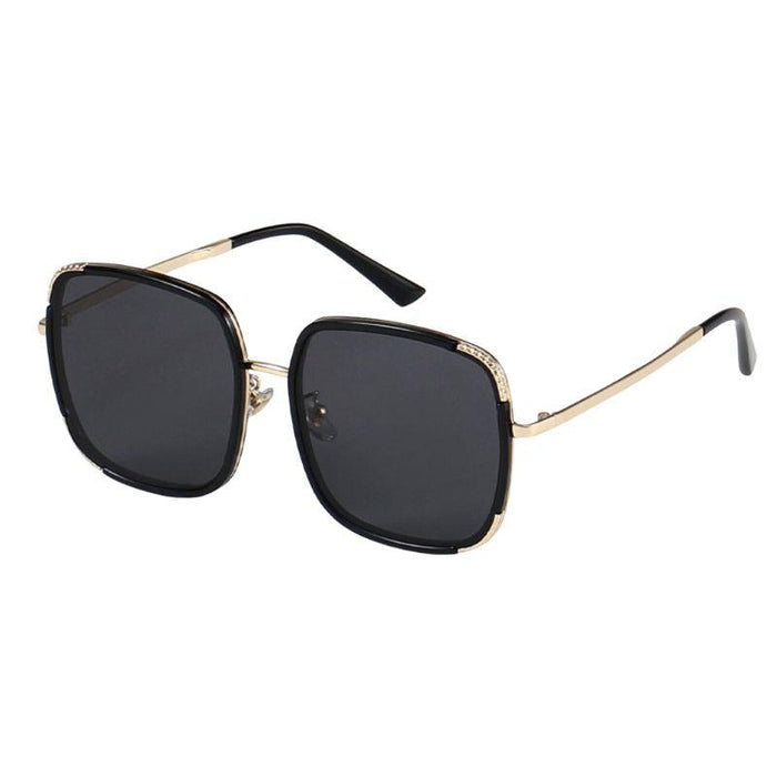 side view of Amalfi Quartz sunglasses from EyeCandys, showcasing a chic summer look with purple tinted lenses and a sleek frame