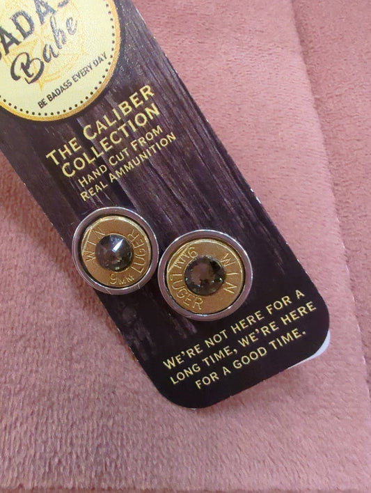 BadAssBabe Caliber Earrings featuring bold, silver-toned ammunition-inspired design, perfect for edgy fashion statements.
