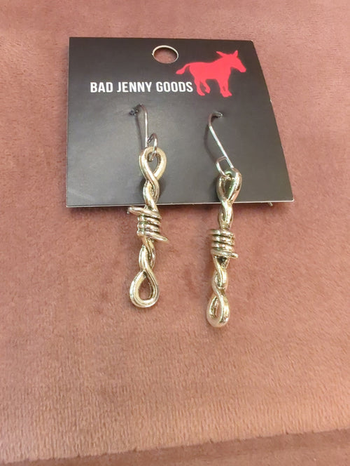 Barbed wire earrings by Bad Jenny Goods, featuring edgy, metallic jewelry with a twisted, barbed wire design for a bold look.