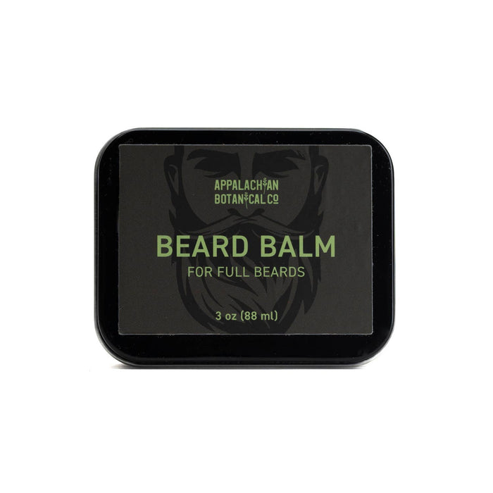 Men's grooming beard balm by Appalachian Botanical Co. in a tin container, with a smooth, natural finish on the balm surface.