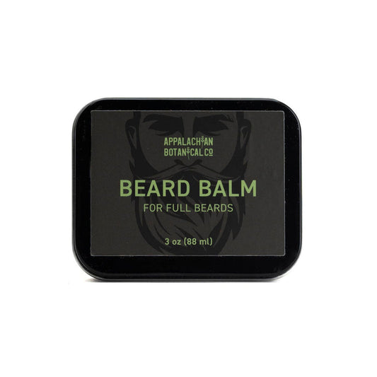 Men's grooming beard balm by Appalachian Botanical Co. in a tin container, with a smooth, natural finish on the balm surface.