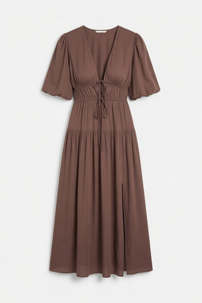 A brown midi-length dress with short puff sleeves, a V-neckline, and a drawstring waist, shown against a plain light gray background.