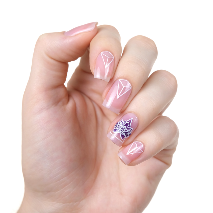 Bold sheer pink nail polish with a glitter accent nail on a light skin tone