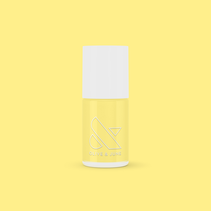 Bright & Focused yellow gel polish bottle by Olive and June for a creative, long-lasting at-home manicure or mani.