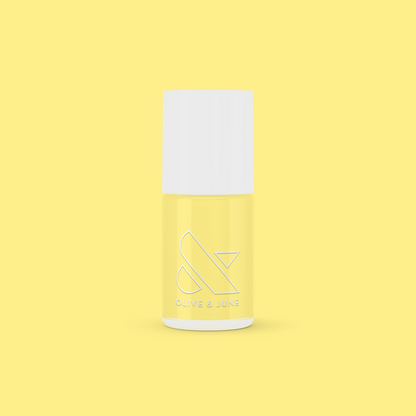 Bright & Focused yellow gel polish bottle by Olive and June for a creative, long-lasting at-home manicure or mani.
