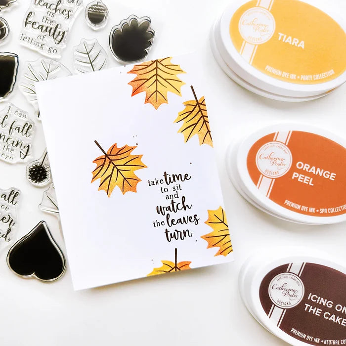Catherine Pooler - Stamp & Die Set - Changing Leaves. Perfect mid-sized leaves for all your cards and scrapbook pages. Includes 5 solid stamp leaves with separate vein and stem stamps. Includes an acorn, gumball and chestnut to add to your fall card. Available at Embellish Away located in Bowmanville Ontario Canada. Card example by Catherine Pooler Designs.