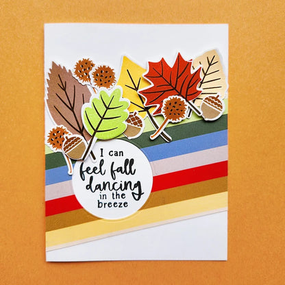 Catherine Pooler - Stamp & Die Set - Changing Leaves. Perfect mid-sized leaves for all your cards and scrapbook pages. Includes 5 solid stamp leaves with separate vein and stem stamps. Includes an acorn, gumball and chestnut to add to your fall card. Available at Embellish Away located in Bowmanville Ontario Canada. Card example by Catherine Pooler Designs.