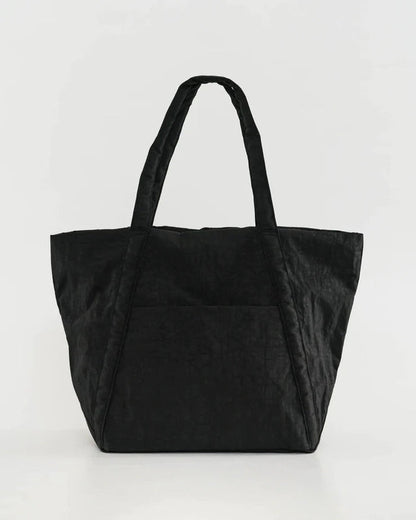 Cloud bag tote in black with two top handles and a wide open main compartment.