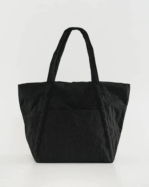 Cloud bag tote in black with two top handles and a wide open main compartment.