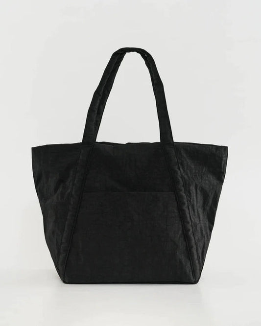 Cloud bag tote in black with two top handles and a wide open main compartment.