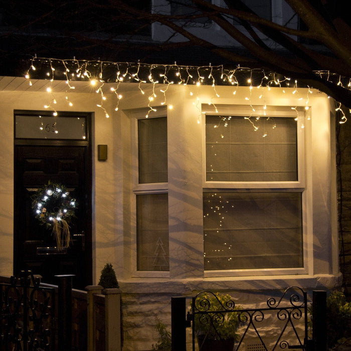ML64YWC_Warm-White-Icicle-Light-christmas-house_P7_00a35423-d094-4e73-9d5d-cbdb2c335927.jpg