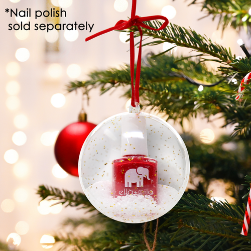 DIY clear ornament with a mini nail polish inside hanging on a Christmas tree