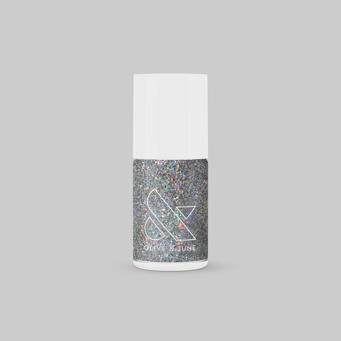 Olive and June Exclamation Point holographic silver glitter nail polish bottle for long-lasting at home mani or pedi