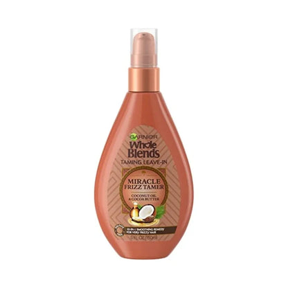 GARNIER whole blends taming leave in miracle frizz tamer coconut oil cocoa butter ￼