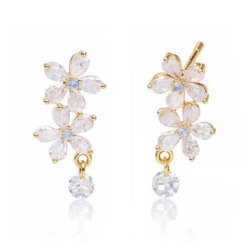 Gold double flower stud earrings with pear-shaped CZ drops and dangling teardrop stone
