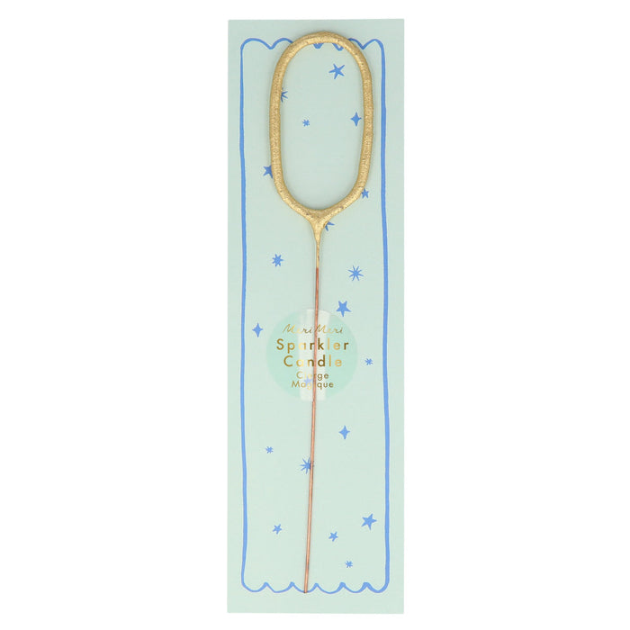 Gold number sparkler candle 0 with blue star pattern and pale blue center