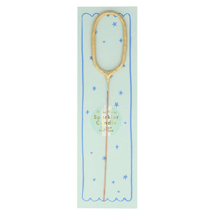 Gold number sparkler candle 0 with blue star pattern and pale blue center