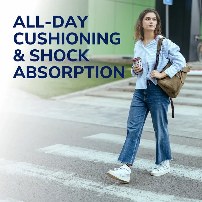 Dr Scholls Heel Cushions text overlay on woman walking across a crosswalk