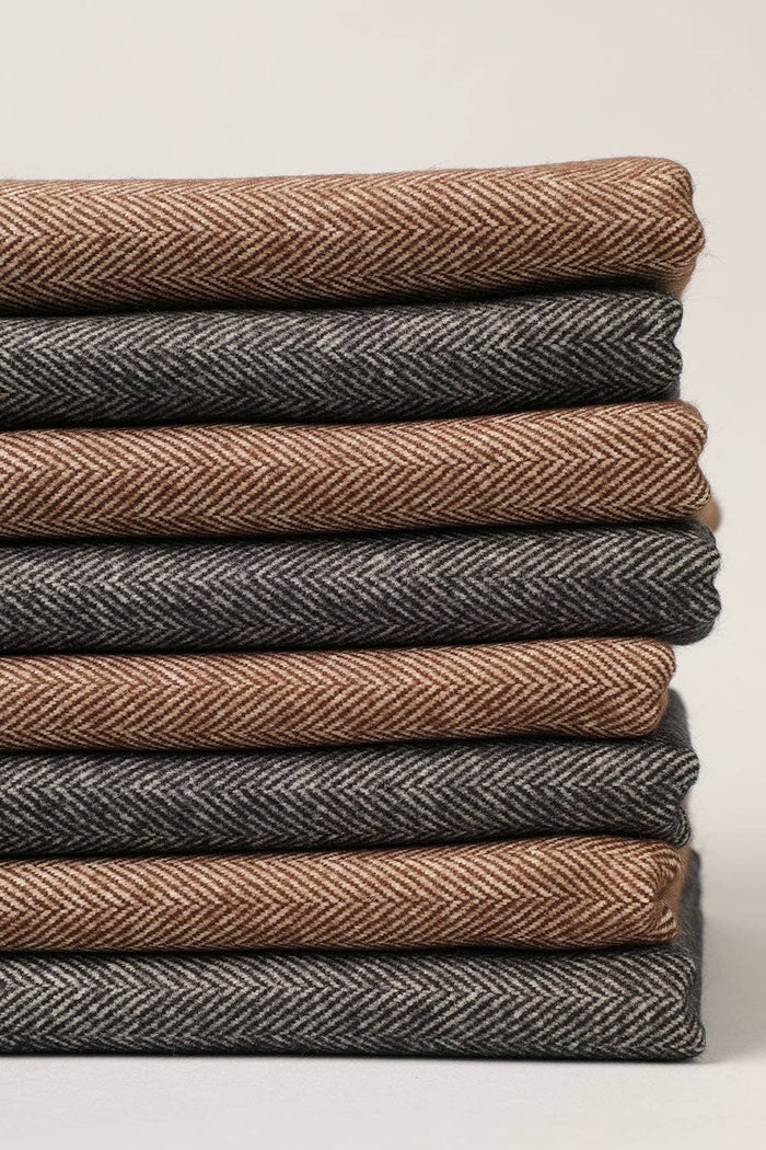 Herringbone muffler scarf by Fashion City, showcasing a stylish woven pattern in neutral tones, perfect for cold weather.