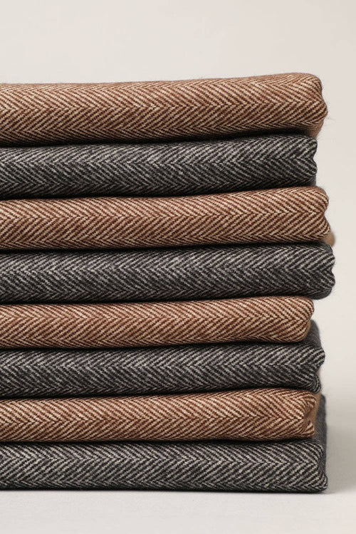 Herringbone muffler scarf by Fashion City, showcasing a stylish woven pattern in neutral tones, perfect for cold weather.