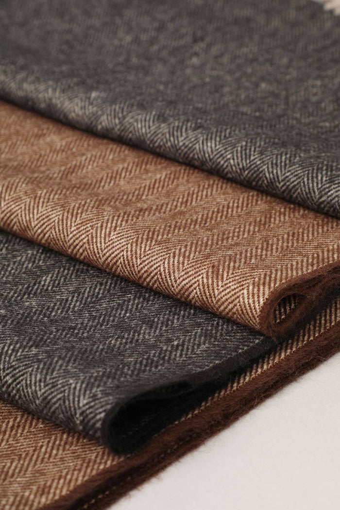 Fashion City herringbone muffler scarf with stylish woven pattern, soft fabric, perfect for winter accessories.