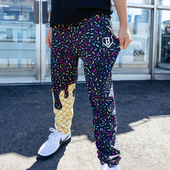 Youth model wearing ice Cream Pajama Pants Midnight Sundae youth pants