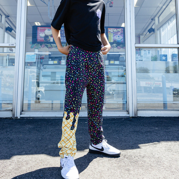 Youth model wearing ice Cream Pajama Pants Midnight Sundae youth pants