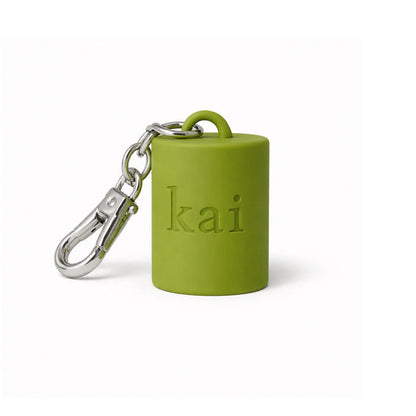 Green Kai keychain cylinder with metal clasp and carabiner ring