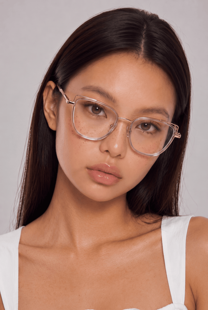 EyeCandys Kaylee Cat Eye glasses model shot featuring elegant cat-eye optical frames with non-prescription clear lenses, prescription-ready women's eyewear, trendy fashion glasses, blue light style frames for everyday wear, office outfits, minimalist fashion, and modern luxury looks.