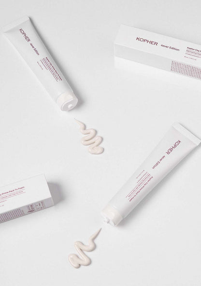 Kopher skincare products with cream on a white background