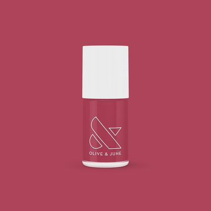 LD nail polish bottle from Olive and June in a rosy pinky rosewood shade for polished manicures at home