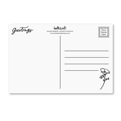 Greetings postcard back with message lines, butterfly flower, and postage stamp box