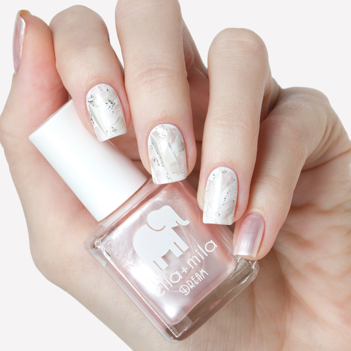 My Fantasy pearly pink nail polish with silver marble accent nails