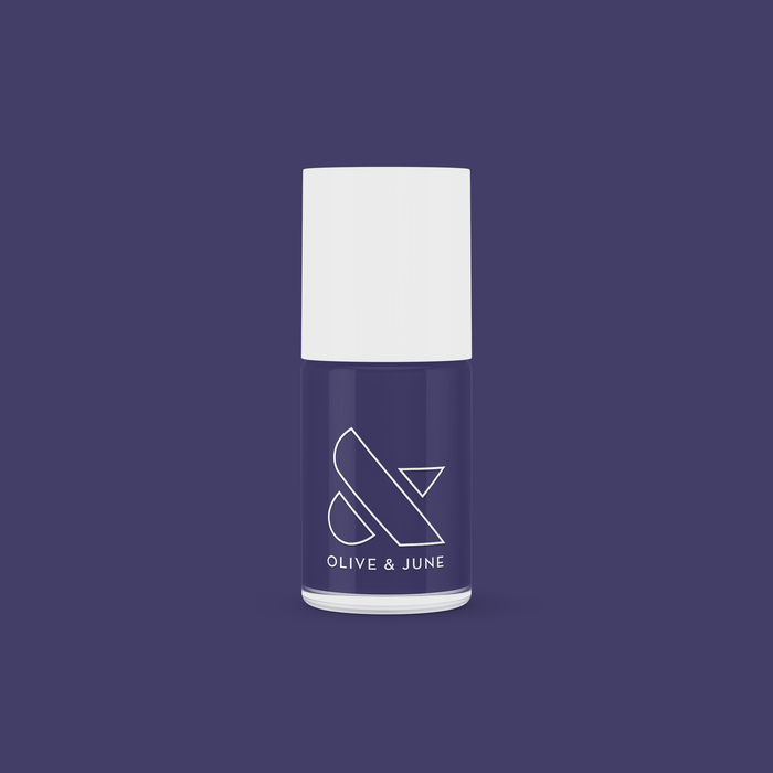 Olive and June OMG nail polish bottle in deep indigo shade for a smooth, long-lasting manicure at home
