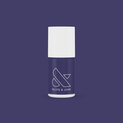 Olive and June OMG nail polish bottle in deep indigo shade for a smooth, long-lasting manicure at home