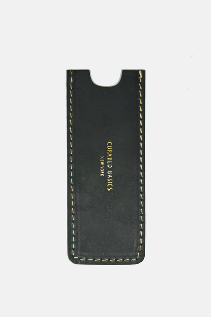 Curated Basics ox-horn comb with wide teeth for gentle hair detangling and natural hair care.
