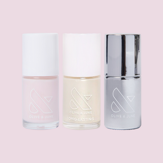 Pearl Polish Set by Olive and June featuring neutral pink, pearlescent shimmer, and silver topcoat for smooth, long-lasting mani
