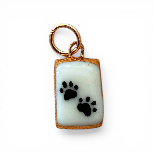 Gold keyring light-blue porcelain charm with two black paw prints