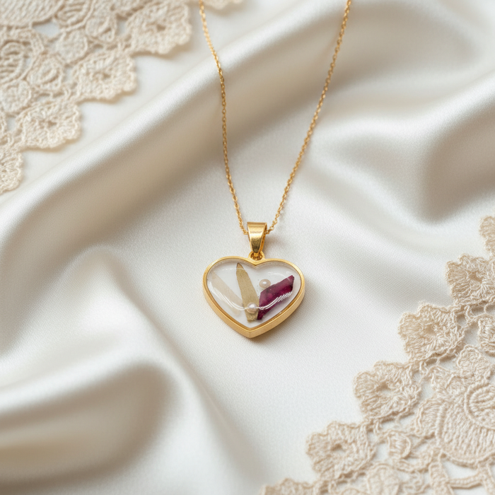 Wild Coast Flower Preservation 2025 advertisement graphic featuring pressed flower heart pendant jewelry, ad 52