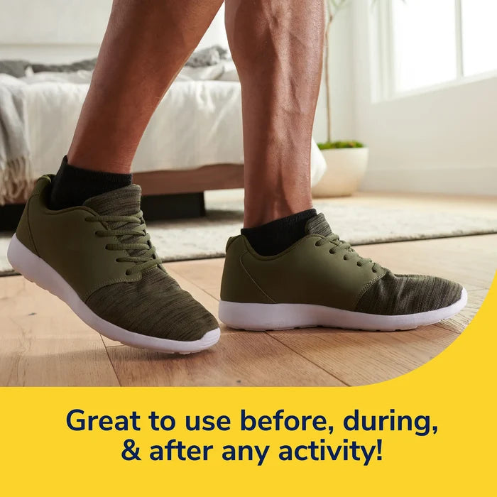 Protective insole cushioning inside olive sneakers, visible under standing legs