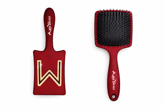 Red paddle brush with gold M