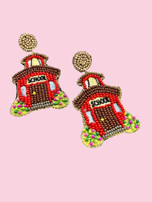 Red beaded earrings from Camel Threads featuring intricate beaded designs, perfect for casual or dressy occasions.