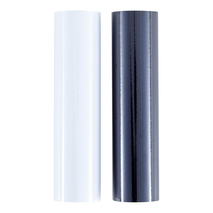 Spellbinders - Glimmer Foil - Opaque Black & White. This Glimmer Hot Foil pack comes in a new 2 pack box format. Each roll is 15 ft. by 5 in. Add stunning and eye-catching foil designs to any project from paper crafts to mixed media and more! Available at Embellish Away located in Bowmanville Ontario Canada.