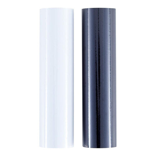 Spellbinders - Glimmer Foil - Opaque Black & White. This Glimmer Hot Foil pack comes in a new 2 pack box format. Each roll is 15 ft. by 5 in. Add stunning and eye-catching foil designs to any project from paper crafts to mixed media and more! Available at Embellish Away located in Bowmanville Ontario Canada.