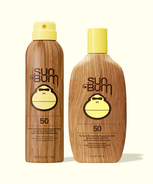 Sun Bum SPF 50 Spray + Lotion in wood-grain packaging, showing spray and lotion bottles side by side.