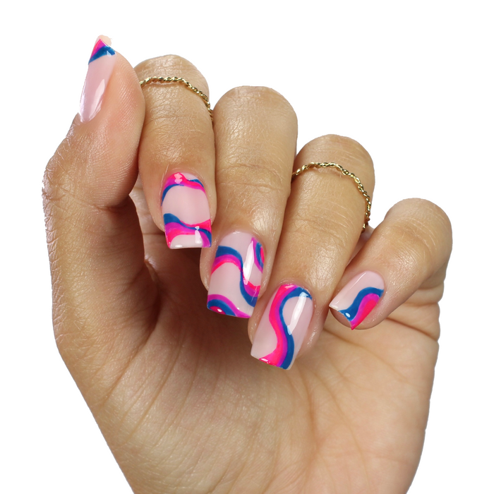 Staycation Vacation fuchsia with pink and blue swirl nail art on a light skin tone