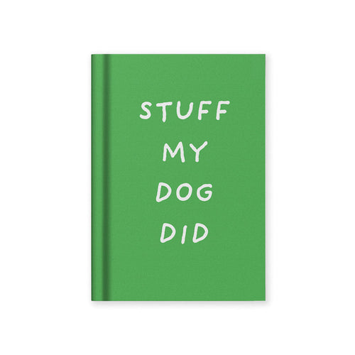 Green hardback fabric notebook with “STUFF MY DOG DID” text on the cover